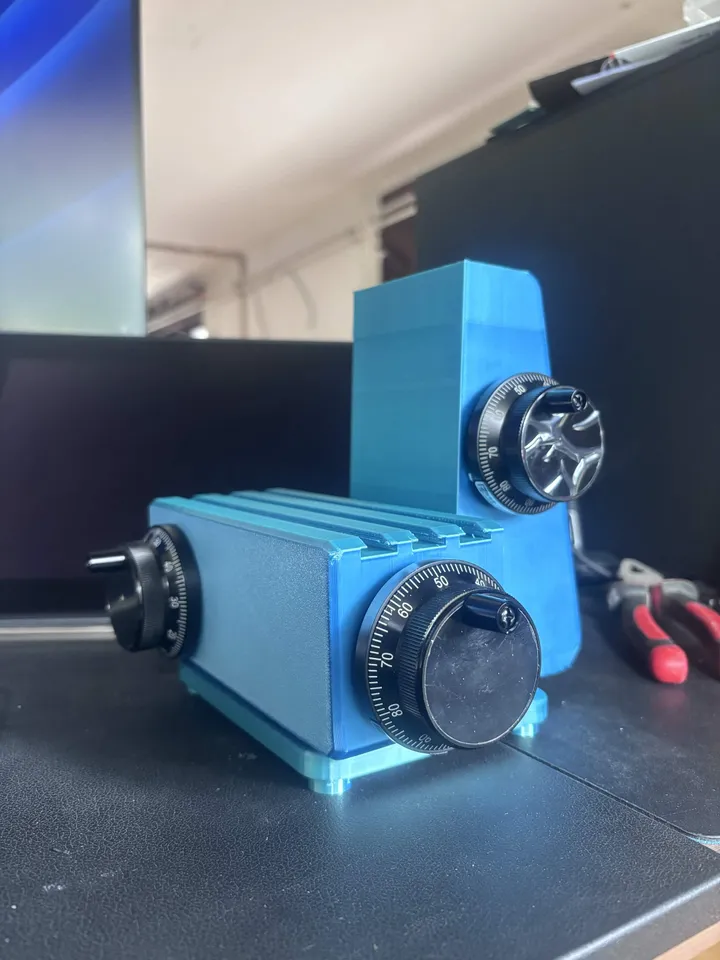 Prototype hardware controller with three encoder handwheels, shaped like a milling machine